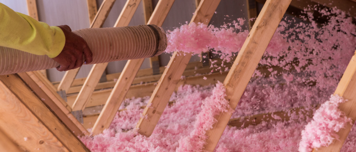 Pink fiberglass blow insulation.